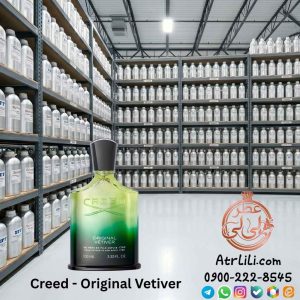 شیشه اورجینال عطر کرید اورجینال وتیور سبز رنگ در میان علفزار